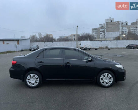 Черный Тойота Королла, объемом двигателя 1.6 л и пробегом 186 тыс. км за 10200 $, фото 1 на Automoto.ua