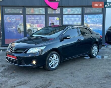Чорний Тойота Королла, об'ємом двигуна 1.6 л та пробігом 134 тис. км за 10000 $, фото 1 на Automoto.ua