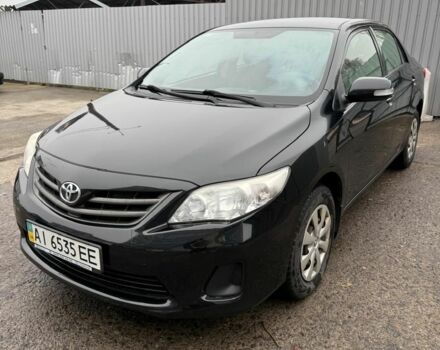 Черный Тойота Королла, объемом двигателя 1.3 л и пробегом 176 тыс. км за 7955 $, фото 1 на Automoto.ua