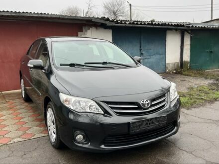 Черный Тойота Королла, объемом двигателя 1.6 л и пробегом 83 тыс. км за 10800 $, фото 1 на Automoto.ua