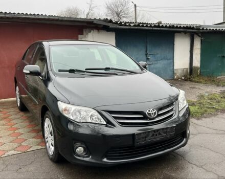 Черный Тойота Королла, объемом двигателя 1.6 л и пробегом 83 тыс. км за 10800 $, фото 1 на Automoto.ua