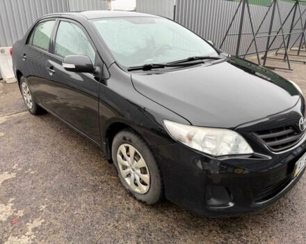 Черный Тойота Королла, объемом двигателя 1.33 л и пробегом 175 тыс. км за 6800 $, фото 1 на Automoto.ua