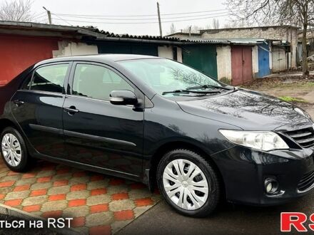 Черный Тойота Королла, объемом двигателя 1.6 л и пробегом 83 тыс. км за 10800 $, фото 1 на Automoto.ua