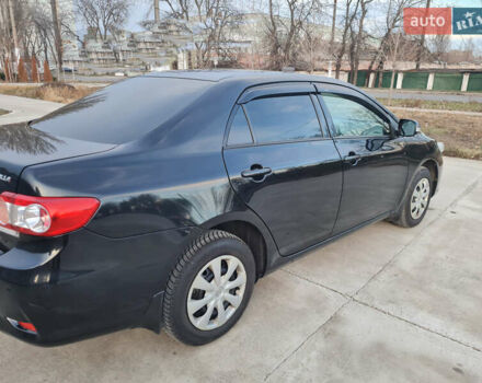 Черный Тойота Королла, объемом двигателя 1.33 л и пробегом 141 тыс. км за 9200 $, фото 1 на Automoto.ua