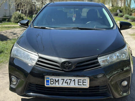 Чорний Тойота Королла, об'ємом двигуна 1.33 л та пробігом 219 тис. км за 9400 $, фото 1 на Automoto.ua
