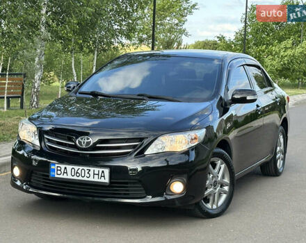 Черный Тойота Королла, объемом двигателя 1.6 л и пробегом 215 тыс. км за 9900 $, фото 1 на Automoto.ua