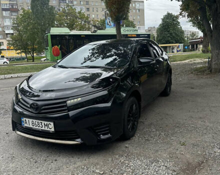 Черный Тойота Королла, объемом двигателя 1.33 л и пробегом 220 тыс. км за 7700 $, фото 1 на Automoto.ua