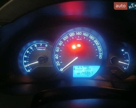 Черный Тойота Королла, объемом двигателя 1.3 л и пробегом 145 тыс. км за 10500 $, фото 1 на Automoto.ua