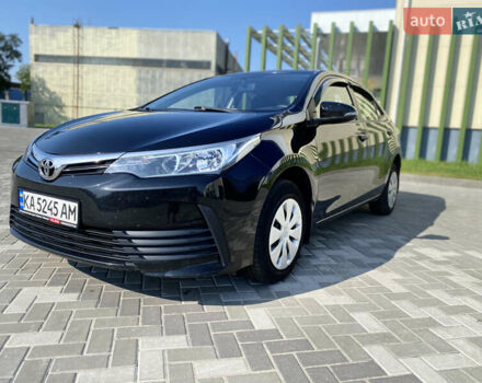Чорний Тойота Королла, об'ємом двигуна 1.59 л та пробігом 134 тис. км за 10700 $, фото 1 на Automoto.ua