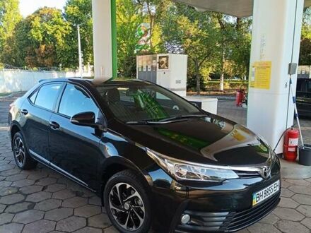 Чорний Тойота Королла, об'ємом двигуна 1.33 л та пробігом 88 тис. км за 12500 $, фото 1 на Automoto.ua