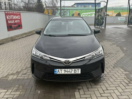 Чорний Тойота Королла, об'ємом двигуна 1.33 л та пробігом 140 тис. км за 11800 $, фото 1 на Automoto.ua