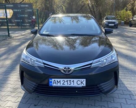 Черный Тойота Королла, объемом двигателя 1.33 л и пробегом 102 тыс. км за 12700 $, фото 1 на Automoto.ua