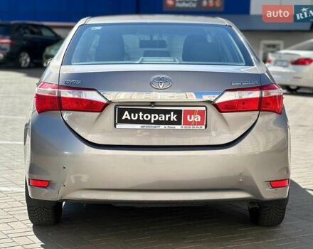 Коричневий Тойота Королла, об'ємом двигуна 1.3 л та пробігом 178 тис. км за 8990 $, фото 4 на Automoto.ua