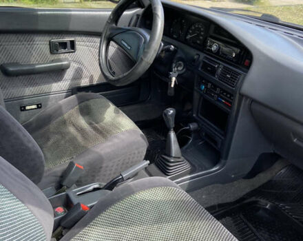 Червоний Тойота Королла, об'ємом двигуна 1.3 л та пробігом 329 тис. км за 2250 $, фото 3 на Automoto.ua