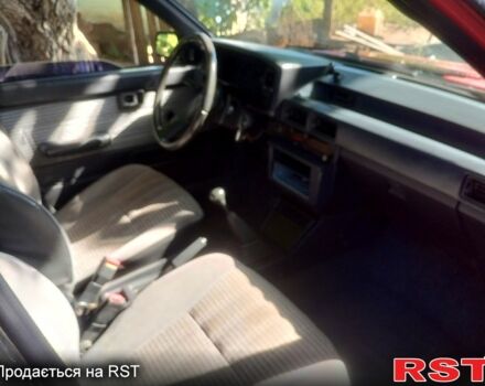 Красный Тойота Королла, объемом двигателя 1.8 л и пробегом 253 тыс. км за 700 $, фото 6 на Automoto.ua