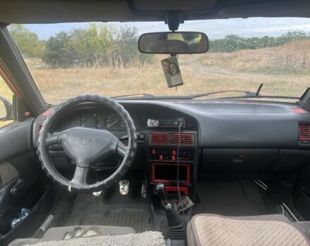 Красный Тойота Королла, объемом двигателя 1.6 л и пробегом 3 тыс. км за 1100 $, фото 5 на Automoto.ua