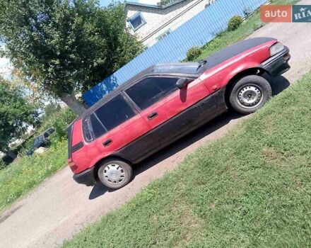 Красный Тойота Королла, объемом двигателя 1.3 л и пробегом 222 тыс. км за 647 $, фото 6 на Automoto.ua