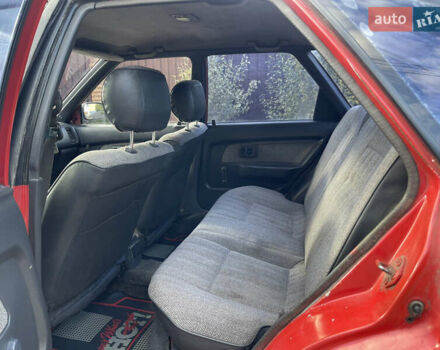 Червоний Тойота Королла, об'ємом двигуна 1.3 л та пробігом 100 тис. км за 1100 $, фото 8 на Automoto.ua