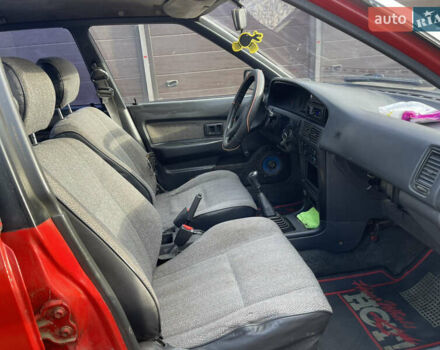 Червоний Тойота Королла, об'ємом двигуна 1.3 л та пробігом 100 тис. км за 1100 $, фото 11 на Automoto.ua