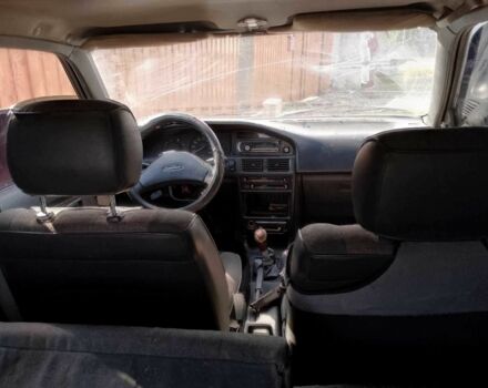 Красный Тойота Королла, объемом двигателя 1.3 л и пробегом 300 тыс. км за 649 $, фото 5 на Automoto.ua