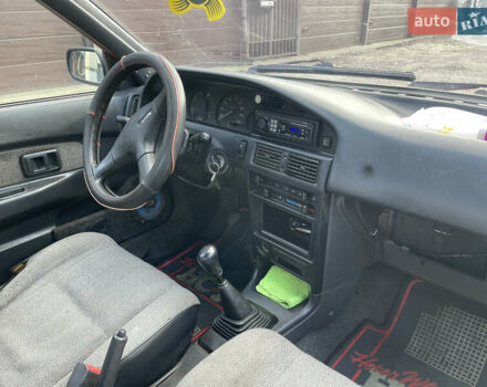 Червоний Тойота Королла, об'ємом двигуна 1.3 л та пробігом 100 тис. км за 1100 $, фото 12 на Automoto.ua