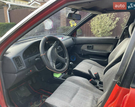 Червоний Тойота Королла, об'ємом двигуна 1.3 л та пробігом 100 тис. км за 1100 $, фото 6 на Automoto.ua
