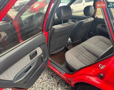 Красный Тойота Королла, объемом двигателя 1.3 л и пробегом 270 тыс. км за 1500 $, фото 16 на Automoto.ua