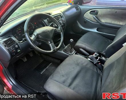 Червоний Тойота Королла, об'ємом двигуна 1.2 л та пробігом 0 тис. км за 1350 $, фото 3 на Automoto.ua