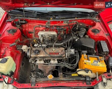 Красный Тойота Королла, объемом двигателя 1.3 л и пробегом 270 тыс. км за 1500 $, фото 21 на Automoto.ua