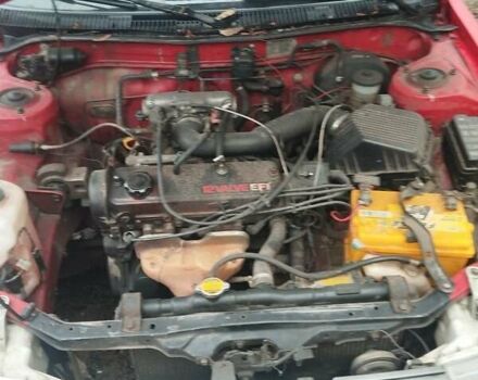 Красный Тойота Королла, объемом двигателя 1.3 л и пробегом 420 тыс. км за 1600 $, фото 9 на Automoto.ua