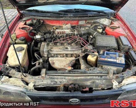 Червоний Тойота Королла, об'ємом двигуна 1.2 л та пробігом 0 тис. км за 1350 $, фото 1 на Automoto.ua