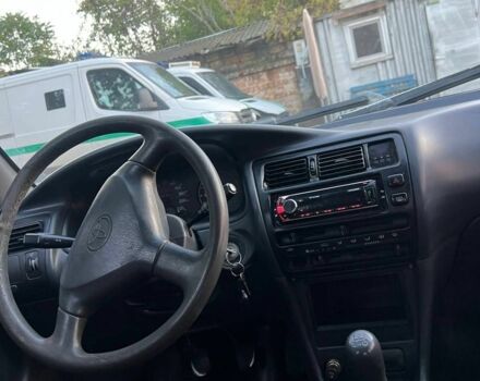 Червоний Тойота Королла, об'ємом двигуна 1.3 л та пробігом 180 тис. км за 1600 $, фото 5 на Automoto.ua