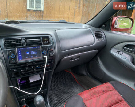 Красный Тойота Королла, объемом двигателя 1.3 л и пробегом 470 тыс. км за 1800 $, фото 5 на Automoto.ua