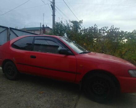 Червоний Тойота Королла, об'ємом двигуна 1.3 л та пробігом 289 тис. км за 2100 $, фото 1 на Automoto.ua