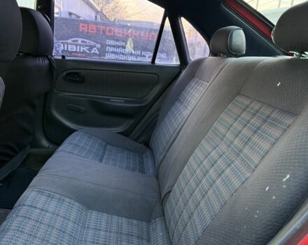 Красный Тойота Королла, объемом двигателя 1.6 л и пробегом 290 тыс. км за 1300 $, фото 7 на Automoto.ua