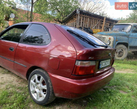Красный Тойота Королла, объемом двигателя 1.3 л и пробегом 470 тыс. км за 1800 $, фото 2 на Automoto.ua