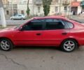 Красный Тойота Королла, объемом двигателя 1.3 л и пробегом 358 тыс. км за 3350 $, фото 1 на Automoto.ua
