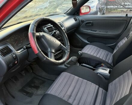 Красный Тойота Королла, объемом двигателя 1.6 л и пробегом 290 тыс. км за 1300 $, фото 8 на Automoto.ua