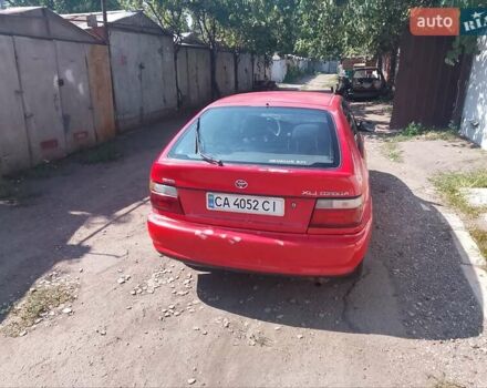 Красный Тойота Королла, объемом двигателя 1.3 л и пробегом 100 тыс. км за 1499 $, фото 4 на Automoto.ua