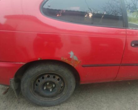 Червоний Тойота Королла, об'ємом двигуна 1.3 л та пробігом 289 тис. км за 2100 $, фото 3 на Automoto.ua