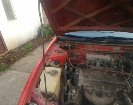 Червоний Тойота Королла, об'ємом двигуна 1.3 л та пробігом 289 тис. км за 2100 $, фото 5 на Automoto.ua