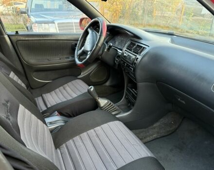 Красный Тойота Королла, объемом двигателя 1.6 л и пробегом 290 тыс. км за 1300 $, фото 9 на Automoto.ua