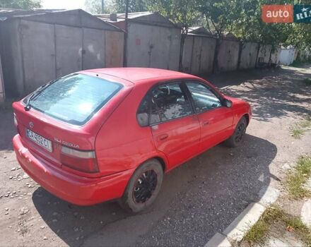 Красный Тойота Королла, объемом двигателя 1.3 л и пробегом 100 тыс. км за 1499 $, фото 3 на Automoto.ua