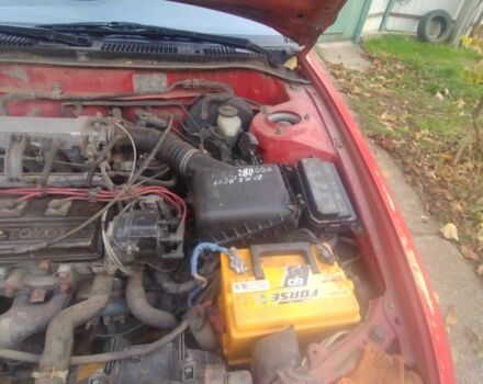 Червоний Тойота Королла, об'ємом двигуна 1.3 л та пробігом 289 тис. км за 2100 $, фото 2 на Automoto.ua