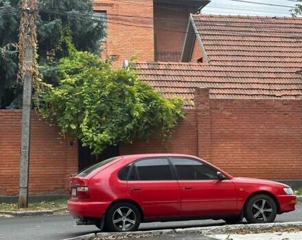 Красный Тойота Королла, объемом двигателя 1.3 л и пробегом 270 тыс. км за 3000 $, фото 7 на Automoto.ua