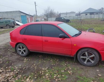 Красный Тойота Королла, объемом двигателя 1.3 л и пробегом 300 тыс. км за 3000 $, фото 1 на Automoto.ua