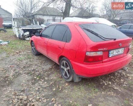 Красный Тойота Королла, объемом двигателя 1.3 л и пробегом 270 тыс. км за 3000 $, фото 4 на Automoto.ua