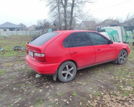 Красный Тойота Королла, объемом двигателя 1.3 л и пробегом 300 тыс. км за 3000 $, фото 2 на Automoto.ua