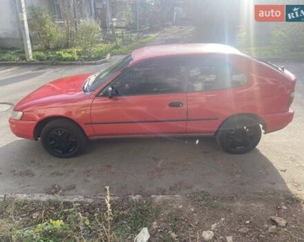 Красный Тойота Королла, объемом двигателя 1.3 л и пробегом 300 тыс. км за 2850 $, фото 2 на Automoto.ua