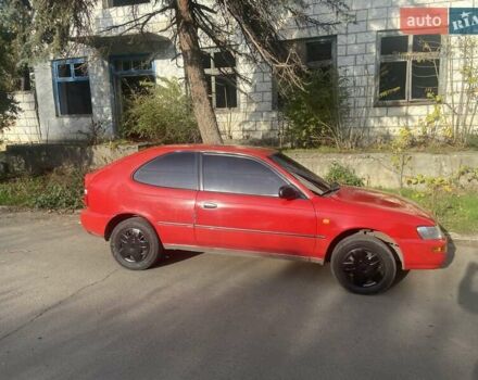 Красный Тойота Королла, объемом двигателя 1.3 л и пробегом 300 тыс. км за 2850 $, фото 4 на Automoto.ua